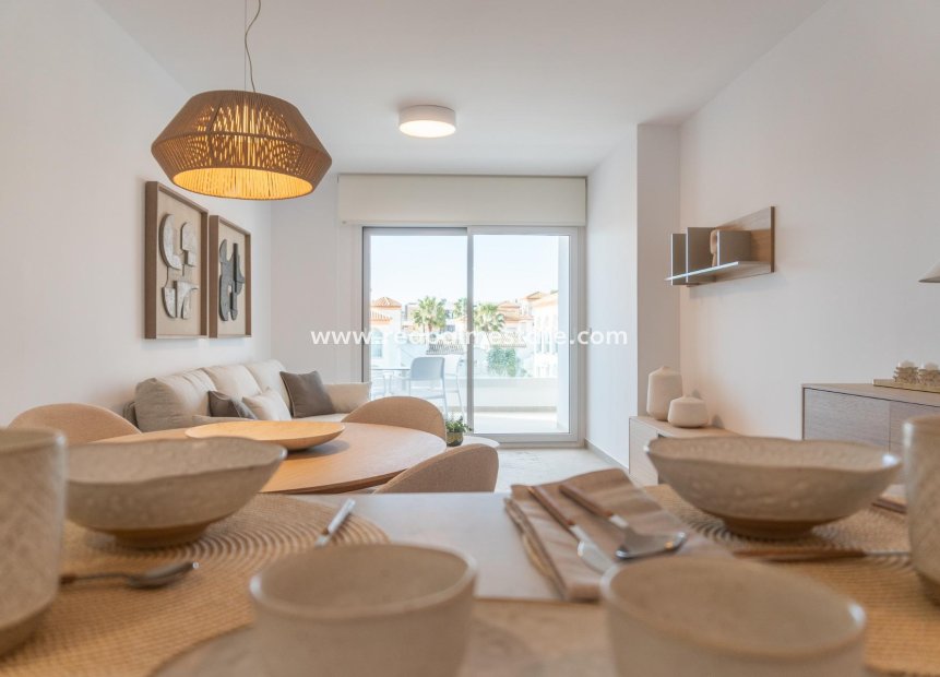 Obra nueva - Apartmentos -
Orihuela Costa - Playa Flamenca