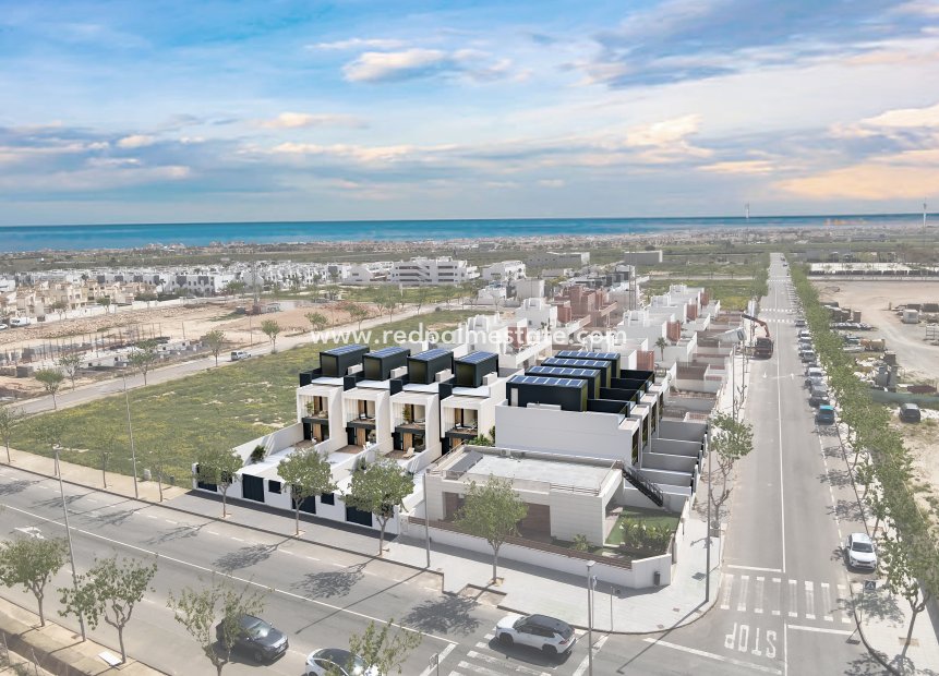 Obra nueva - Casa Adosada -
Pilar de la Horadada